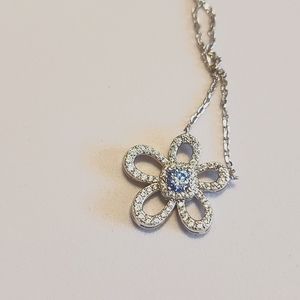 Moissanite necklace in icy blue.